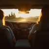 Young couple drives off into the sunset